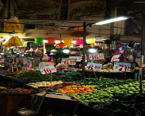 A wide view of fresh vegetables at a local Mexican market